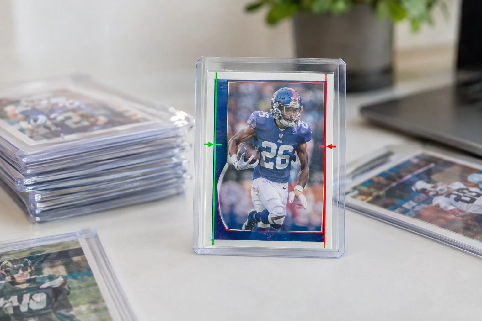 Close-up of trading card border measurement showing centering ratio analysis with visual overlay on left and right borders