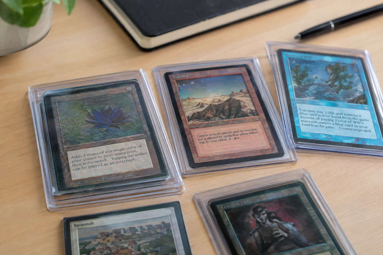 Magic the Gathering Black Lotus and Reserved List cards laid out for AI grading analysis