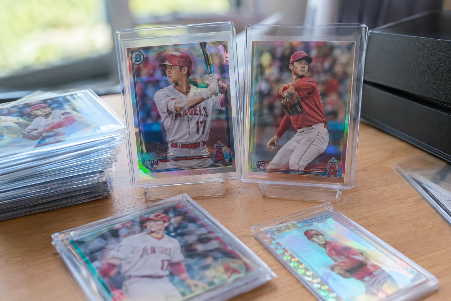 Shohei Ohtani baseball cards including Bowman Chrome and Topps Chrome rookie cards displayed for grading
