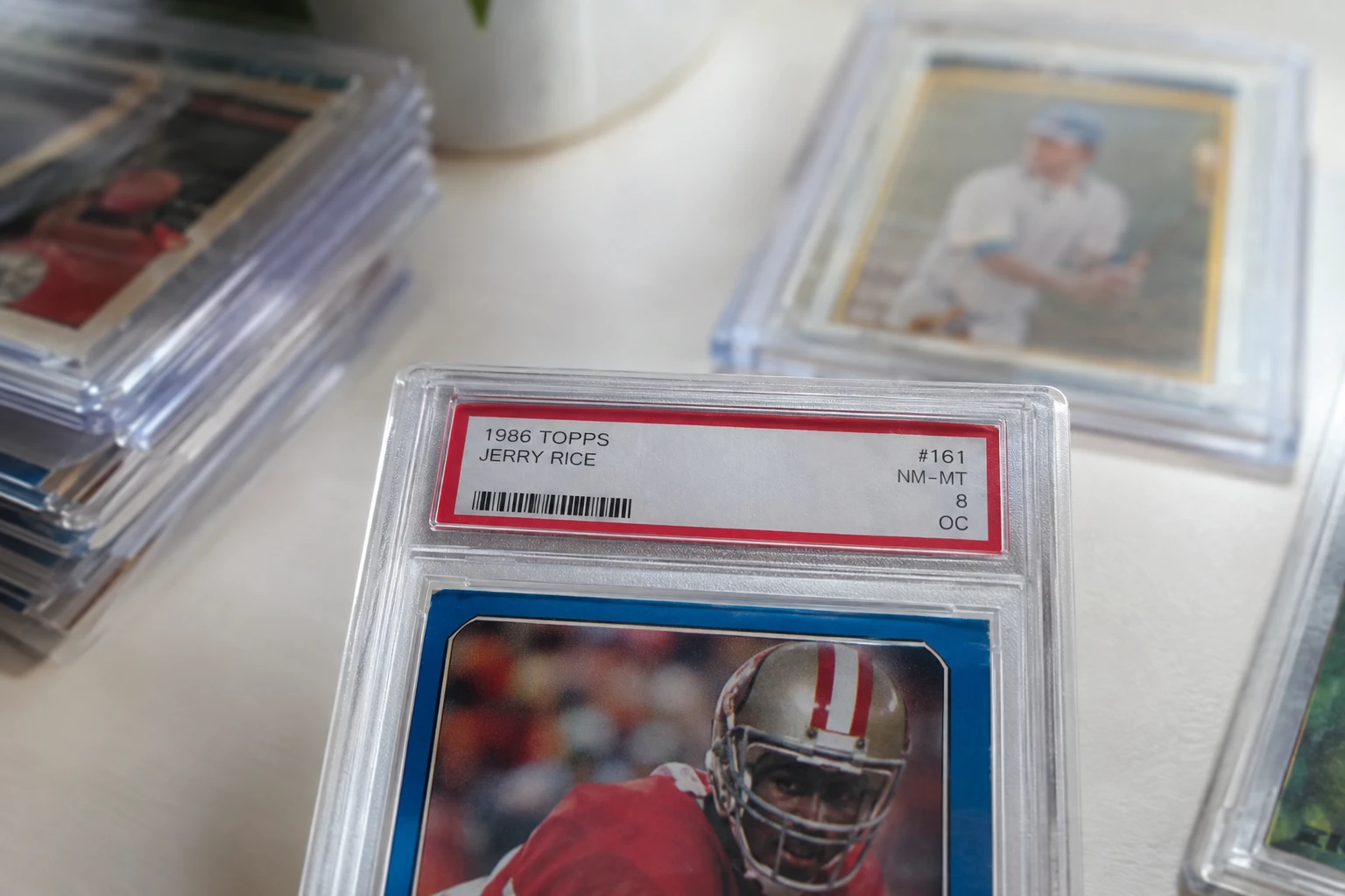 Close-up of a vintage PSA-graded card label showing a qualifier notation